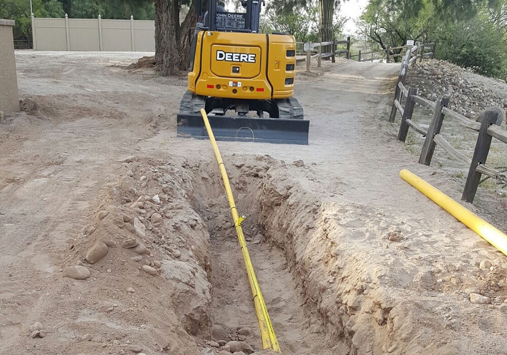 photo of Liberty Gandy Pipeline gas services in action; A large trench with new pipeline being lain down